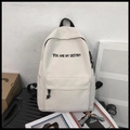 Detailed view of a white student backpack featuring You Are My Destiny black lettering - Basic Style / Off-white