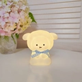 Beige cartoon animal night light with a blue plaid bow on a white desk - Large Sheep - White - Blue