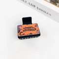 Gothic Halloween hair claw clip featuring black hat and pumpkin graphics on orange base - Halloween #7 - Square