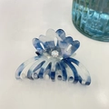 Detail of blue marble acetate hair claw clip with crystal flower and gold lettering - Deep Blue Ink - Rhinestone