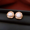 Detailed macro view of French vintage gold-plated round earrings with white cotton pearl texture - Real Gold Plated Beige Wavy Irregular Round (Silver Pin)