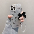 Transparent phone case with black bow patterns and pearl beaded wrist strap accessory - Black Butterfly Pearl Bracelet Style