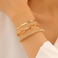 Close-up of a three-piece gold chain bracelet set featuring snake and paperclip link designs - 23 KC Gold WG-0375