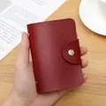 Red lychee pattern card holder with anti-demagnetization and silver snap button closure - 24 Slots / RFID Red