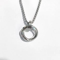 Silver interlocking three-ring pendant necklace with diamond accents on a white background - Steel