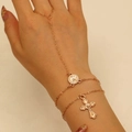 Gold layered slave bracelet featuring religious coin relief and cross charms on hand - 35kc Gold Dz-364