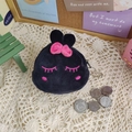 Detailed close-up of a black plush coin purse with a pink bow and cute embroidery - Black Rabbit