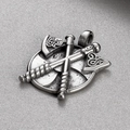 Macro detail of silver vintage Viking shield pendant with crossed axes on textured background - Silver Axe Shield Style (KP130637-TLX)