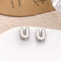 Polished silver U-shaped metal stud earrings with a minimalist horseshoe design - Silver Letter U