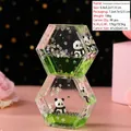 Panda liquid motion timer with green oil drops and cute figure in hexagonal frame - Panda Double Rhombus Quicksand Ornament