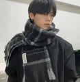 Winter mohair scarf with black and grey plaid pattern and tassels on male model - Black Grey Tag Plaid