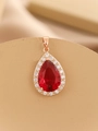 Detailed macro view of a red pear-cut zircon pendant with rose gold plating - Rose Gold Three-Prong Rose Red Zirconia