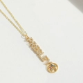 Custom gold name necklace featuring PRESLEY pendant with a colorful gemstone star - Pentagram