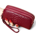 Deep burgundy leather clutch with snakeskin texture, triple zipper and wrist strap - Burgundy