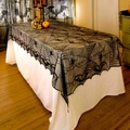 Close-up of black lace spider web tablecloth with elegant wavy edges for Halloween decor - Large Bat Tablecloth 122*244cm