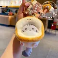 Cat toast plush keychain in warm yellow and grey with squeak function and gold clip - Toast Cat