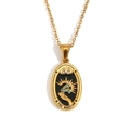 Golden tarot necklace featuring oval Magician pendant with blue crystals and sun motif - Oval Tarot - The Magician / Gold