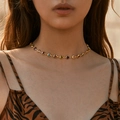 Choker necklace featuring colorful heart-shaped glass stones on a gold metal chain - 18K Gold