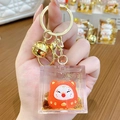 Handheld Lucky Cat acrylic keychain with golden sand flowing effect and a small bell - Lucky Cat Family - Blessing Cat / Individual Packaging