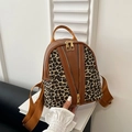 Mini leopard print backpack with brown leather trim and dual decorative gold zippers - Yellow Brown