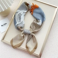 Blue and orange silk square scarf with geometric horse motif tied in a bow - Khaki Wave Belt