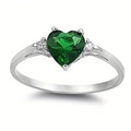 Detail view of heart-shaped green gemstone ring with side diamond accents on silver band - Green