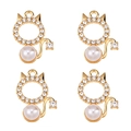 Detail of four gold cat-shaped pendants with white pearls and sparkling zircons - Cat Shape Pearl (px1086-27)