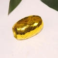 Golden laser ribbon for gift wrapping and party decoration on a clean white backdrop - Coated / Gold