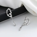 Pendientes de mariposa plateados con diseño de lava irregular y estilo calado fino - Pendientes de mariposa huecos / Plateado