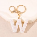 Porte-clés lettre W en résine avec paillettes dorées et fermoir métallique chic - Lettre W