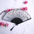 Gray bamboo folding fan with floral butterfly patterns and matching gray tassel - Grey-Silver Flower & Butterfly Pattern, Black Rib Style (Women's Fan-58)