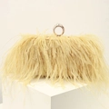 Close-up of yellow ostrich feather evening bag with a gold rhinestone ring clasp - Yellow