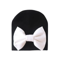 Warm black baby beanie with a large white bow decoration for infants aged 0-6 months - 0-6 Months / Black and White Patchwork