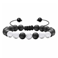 Close-up of adjustable woven bracelet with black lava stone and white turquoise beads - White Turquoise + Lava Stone