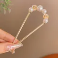 Elegant U-shaped golden hair pin with five white pearls and crystal flowers for women - Aa0120 Four-Pearl Two-Flower - Gold