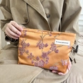 Retro orange satin floral embroidery handbag with woven label for travel and makeup - Orange Plum