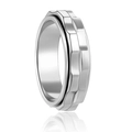 Macro shot of 6mm silver stainless steel spinner ring with geometric wave texture - Silver