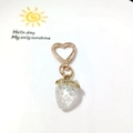 Glittery pink strawberry keychain with golden heart clasp on decorative tray - Heart Clasp-Transparent White Strawberry
