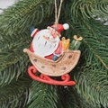 Hanging resin Santa Claus in a wooden sleigh ornament with colorful gift boxes - Yellow Sleigh Santa Claus