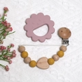 Pink lion silicone teether with yellow wood bead pacifier clip on a soft white texture - Lion Teether + Beaded Chain / Ginger Yellow
