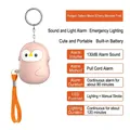 Pink penguin personal safety alarm with 130dB sound and integrated LED light keychain - Chinese Packaging / Penguin / Sakura Pink