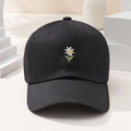 Classic black cotton baseball cap with white daisy embroidery for sun protection - Black