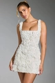 Robe courte blanche sans manches avec texture rose 3D et coupe ajustée élégante - S / Blanc
