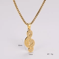 Detailed size view of a gold treble clef pendant necklace with cubic zirconia stones - Treble Clef Style