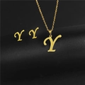 Detailed view of polished stainless steel letter Y pendant necklace and stud earrings set - Letter Y / Gold