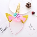 Macro detail of unicorn headband with gold horn, sequin ears, and delicate handmade silk flowers - Gold Unicorn