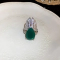 Elegant gold-plated ring featuring pear-cut green emerald stone and wing-shaped crystals - Style 37 Silver (Wing Teardrop Design)