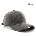 Gray washed baseball cap with distressed hole details and adjustable back strap - Gray