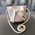 Pink woven straw crossbody bag for girls featuring a large bow and bear logo detail - Dusty Pink (Bag)