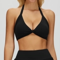 Fashionable black halter yoga sports bra with front twist detail and high-waist fit - M / Premium Black